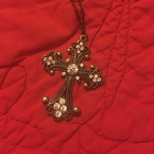 Rhinestone cross necklace with 32 inch chain.