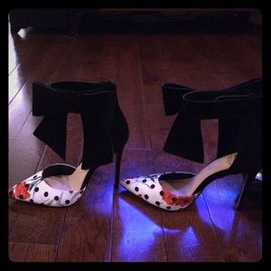 floral with black polka dots and black velvet bow.