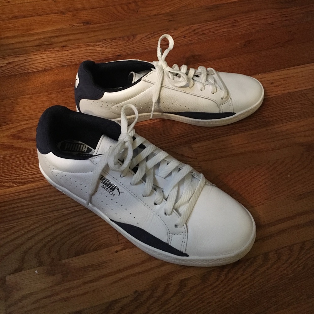 White and navy pumas
