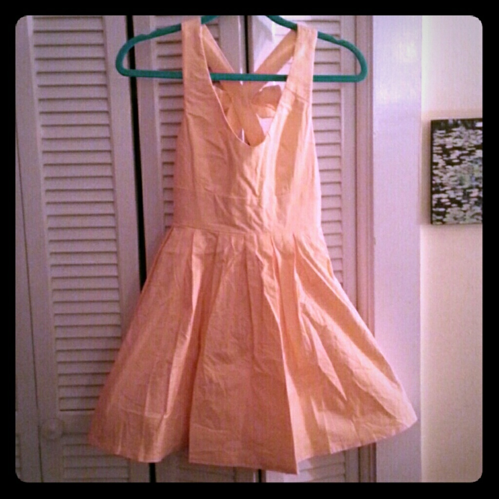 Peach sundress with a bow in the back!