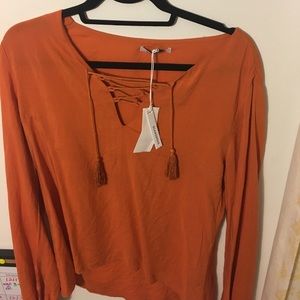 Orange lace up tee