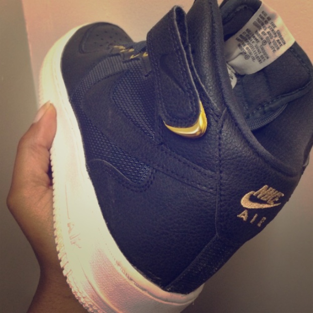 Gold and black Air force ones