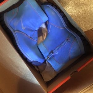 Baby blue w pink stitching Nike boots