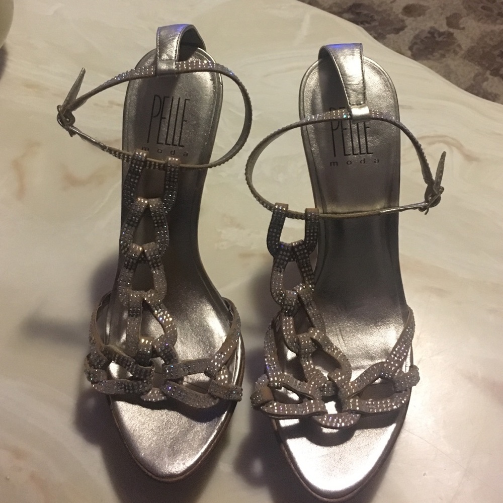 Silver studded gorgeous shoes. Worn a few times.