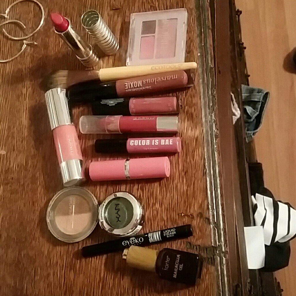 Bundle of makeup, bracelets and makeup.