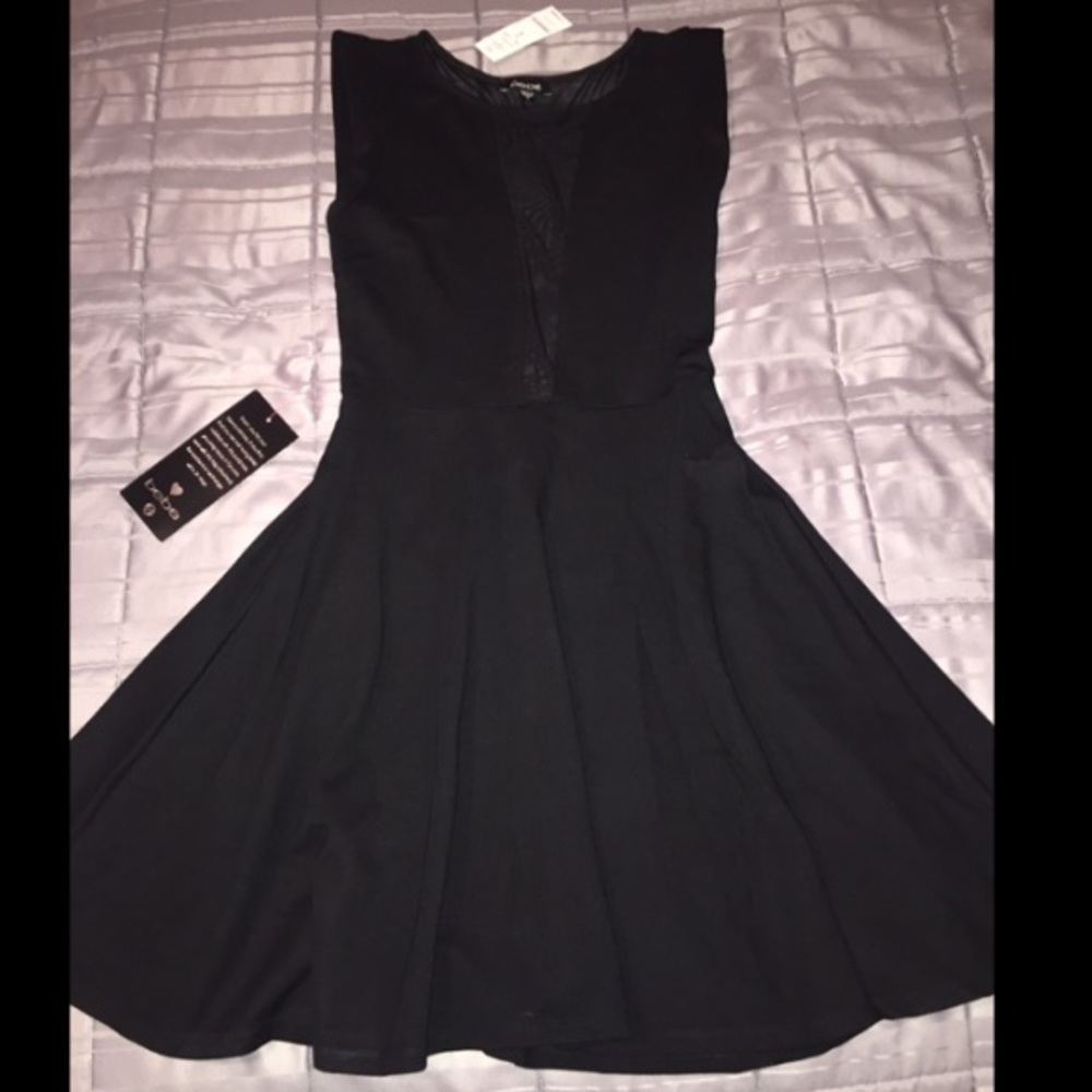 BEBE Fit+Flare sheer back dress