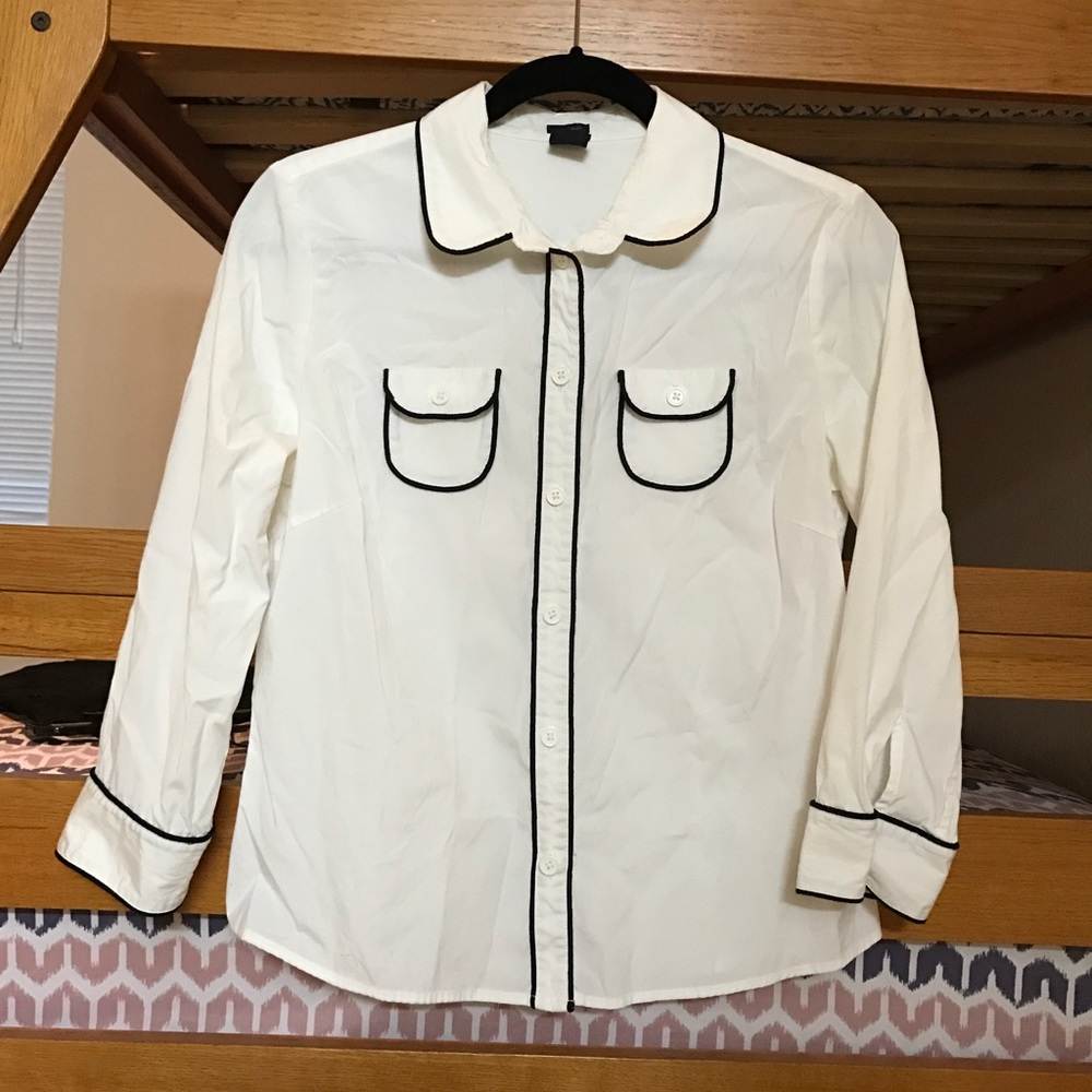 White with black trim blouse.