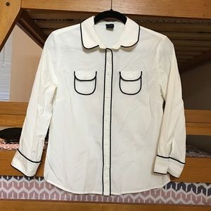 White with black trim blouse.