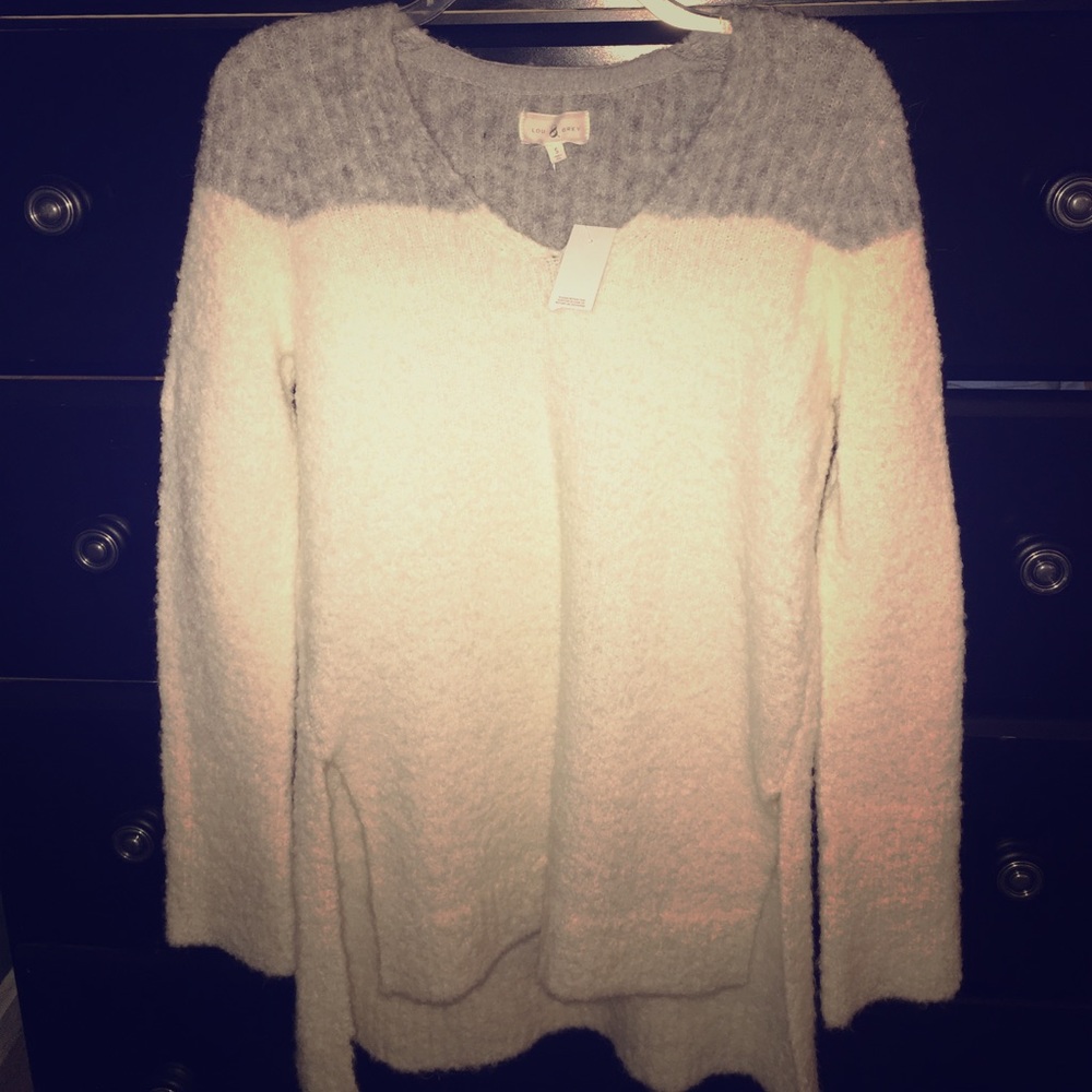 Very soft long sweater! NEVER WORN!