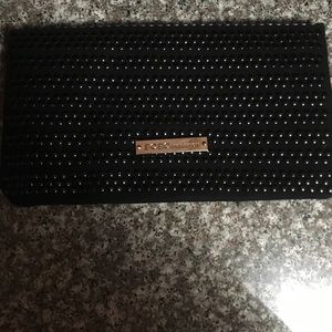 BCBG mix media flap clutch