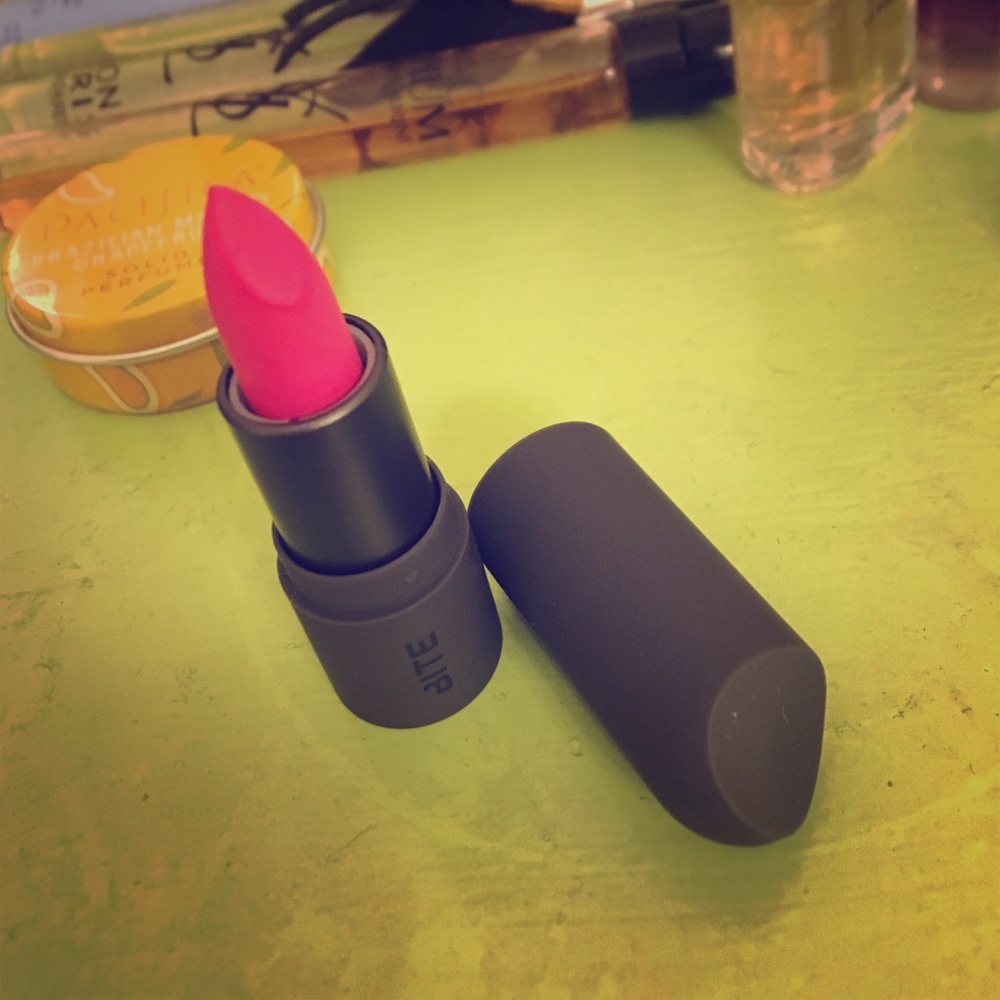 BITE beauty Kimchi travel size lipstick.