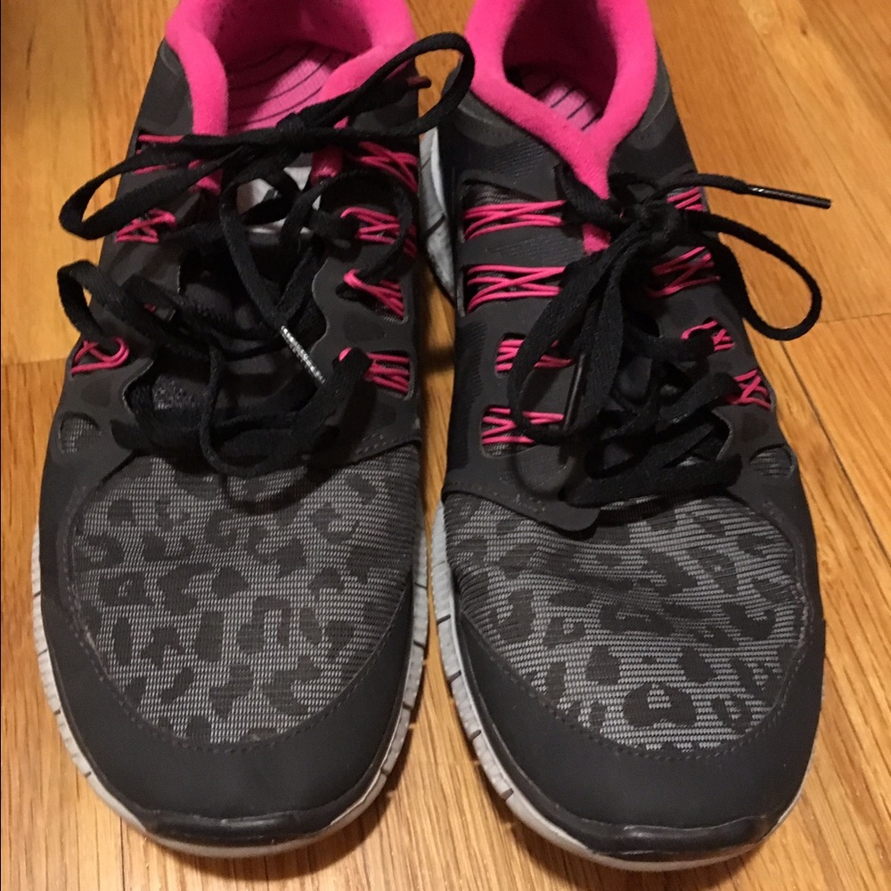 Black, pink, and cheetah Nike free 5.0