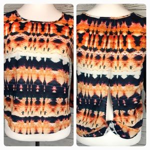 Ikat open back blouse.