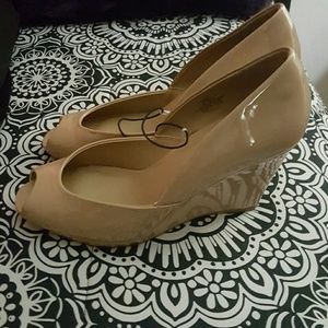 Nude color peep toe wedges
