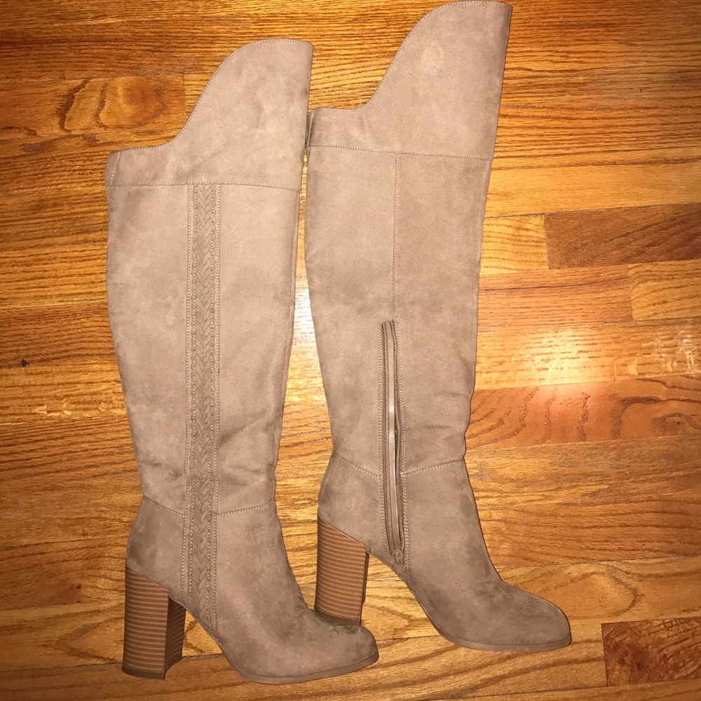 Beige over the knee boots.