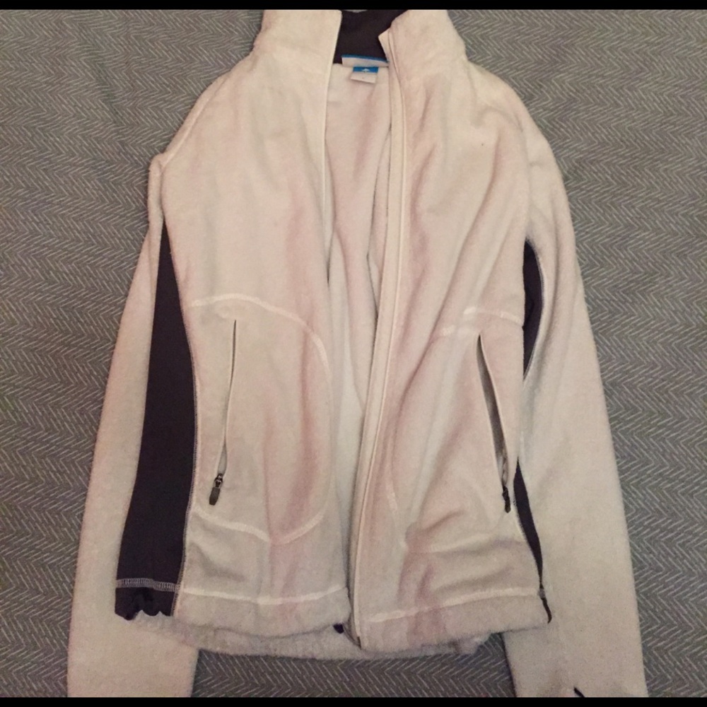 A grey and white Columbia zip up size small fleece