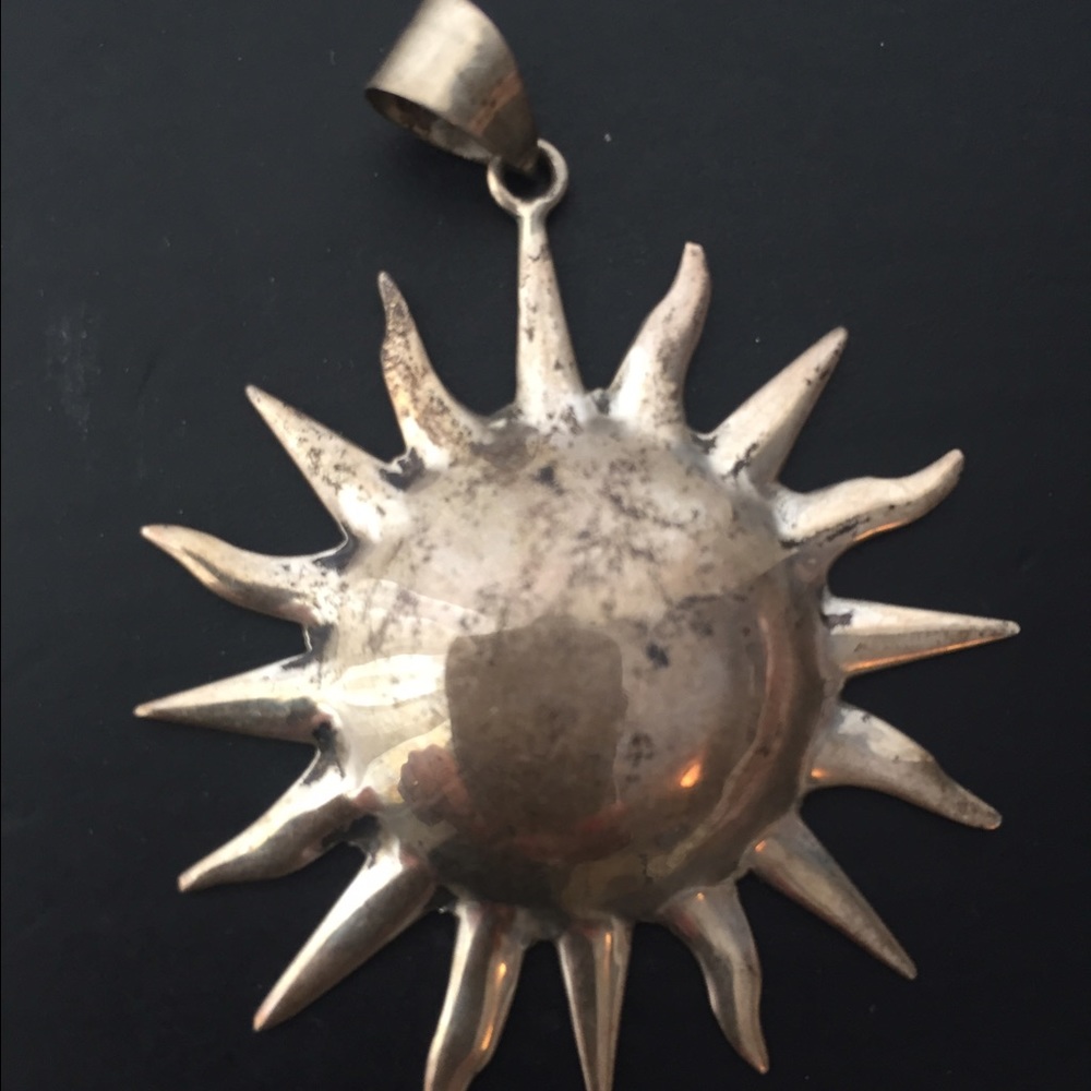 Sterling silver sun charm