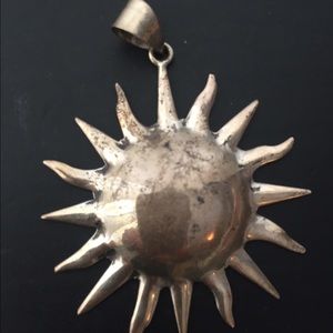 Sterling silver sun charm