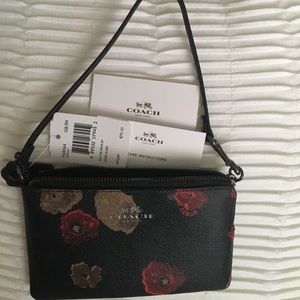 Coach wristlet, new with tags.