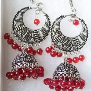 Silver jhumkha earrings with red beads