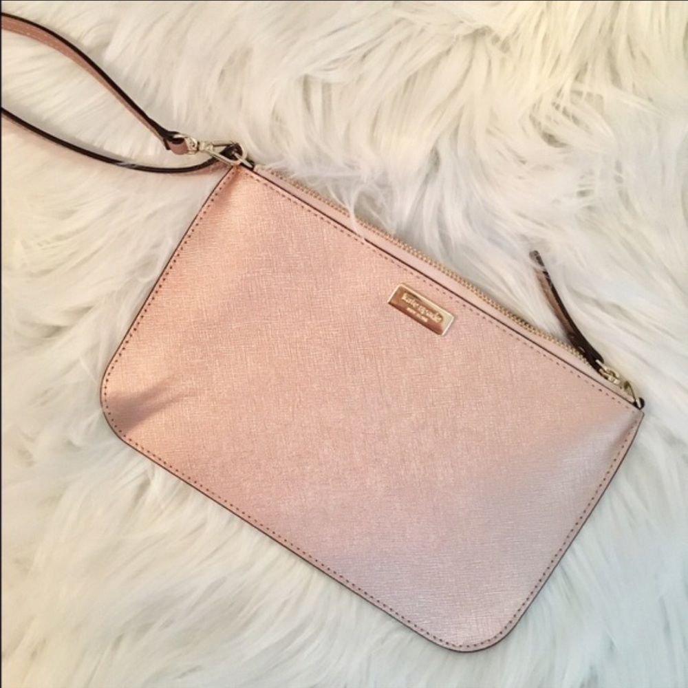 Very gently used rose gold Kate Spade wristlet