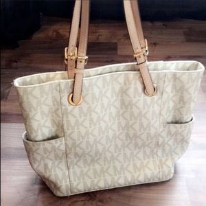 ISO- this Michael kors in either brown or cream!