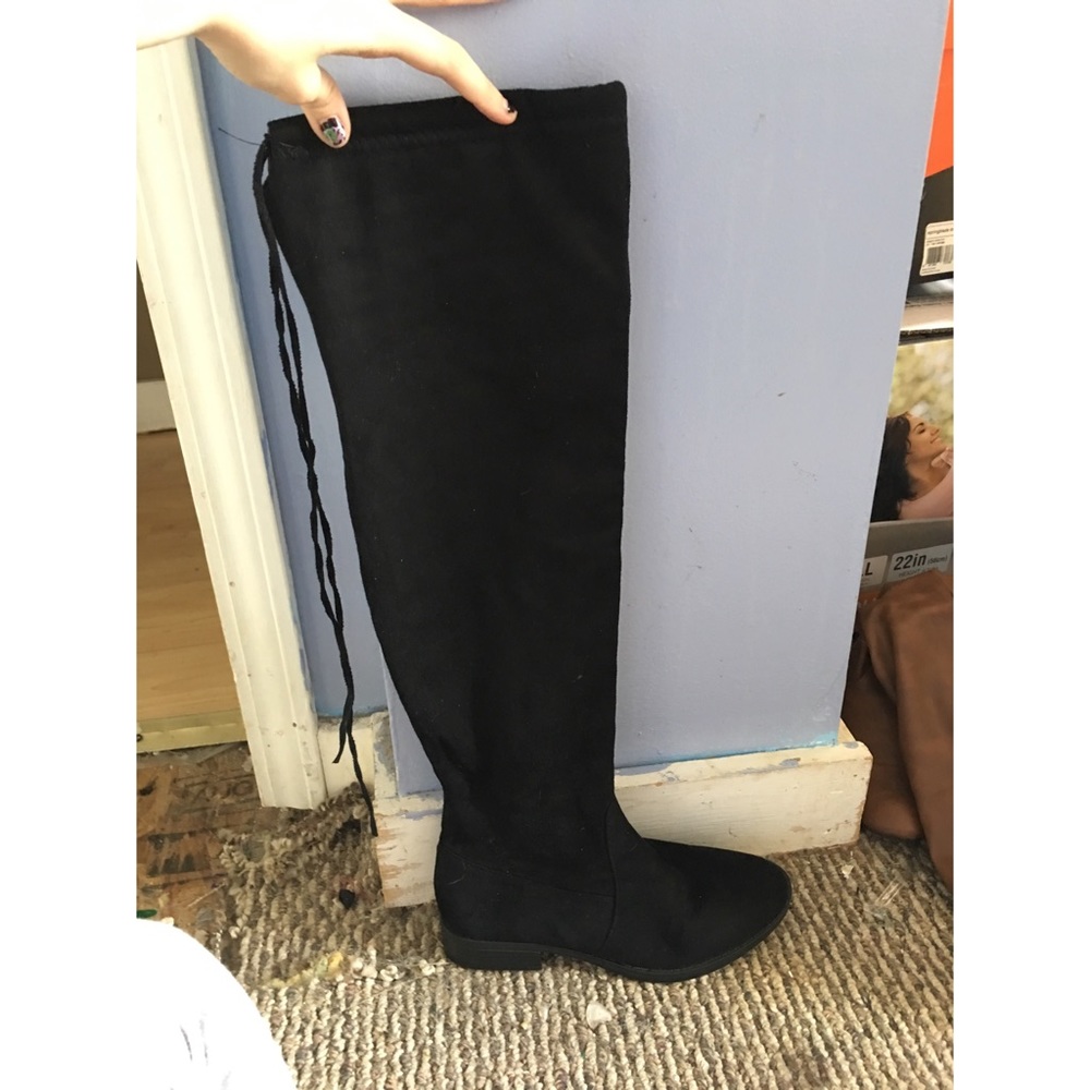 Over The Knee black suede boots.