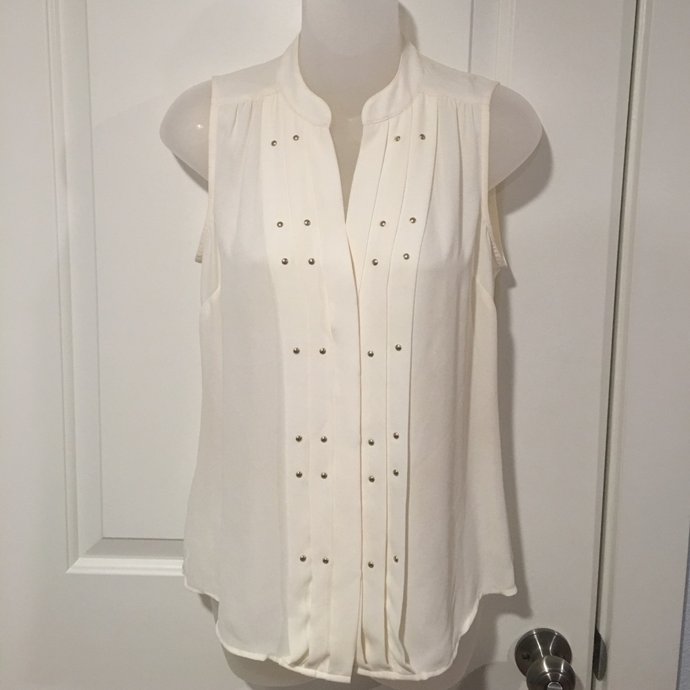 Cream sleeveless blouse by Cache