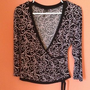 Black and pink swirl wrap top