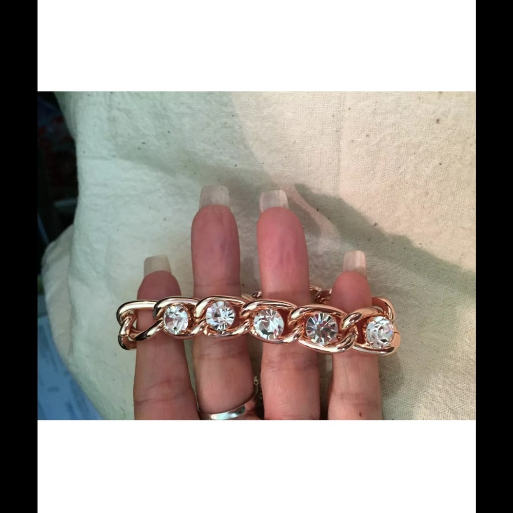 ( CACHE ).  Chain Ring Gold Bracelet