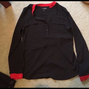 The limited black blouse NWOT