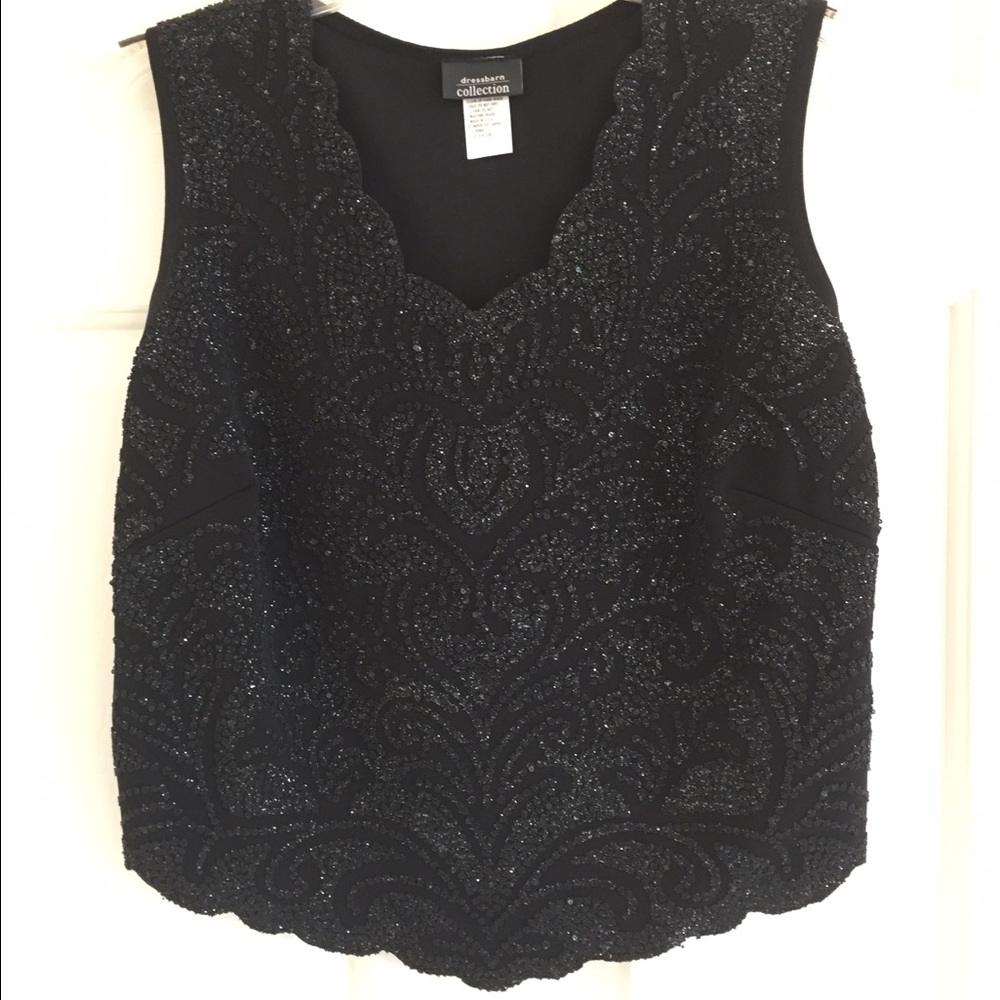 Formal sequined sleeveless vest.