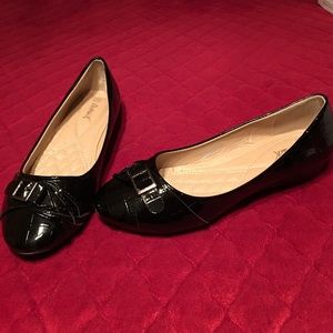 Victoria K black patent leather wedge flats.