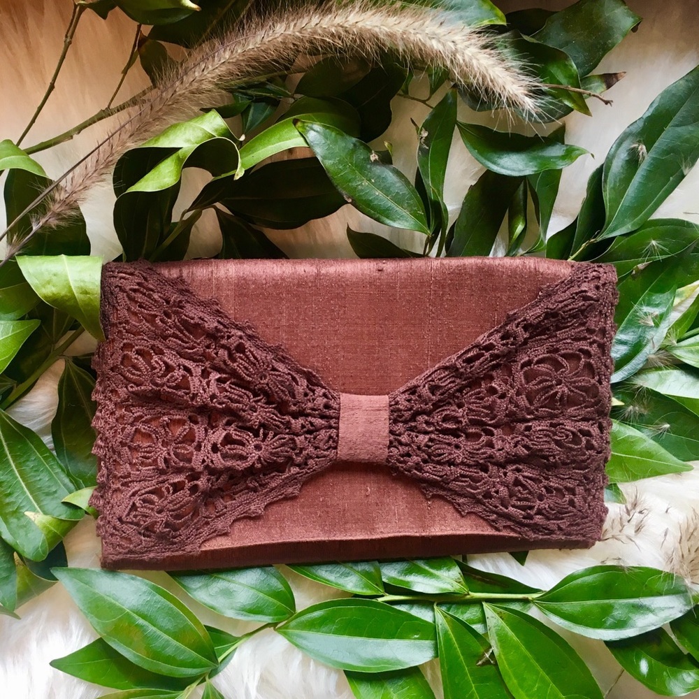 Fair trade casual brown clutch with crochet detail