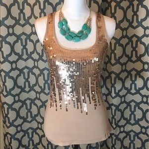 Tan tank with bronze sequence