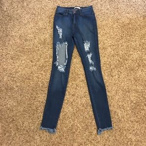 High waisted ripped jeans.