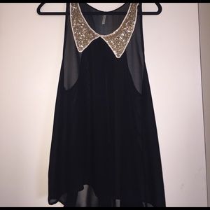 Black sheer tank with gold sequenced collar