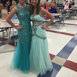 Teal prom dress(on the left) ⭐️
