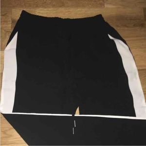 Black H&M pants with white stripe
