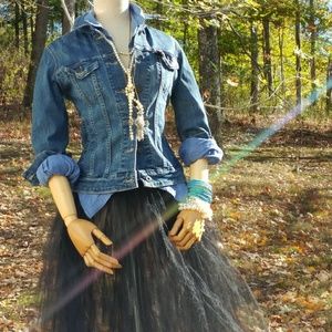 Upcycled Levi jean jacket. Has stretch.