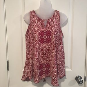 Red and cream patterned blouse
