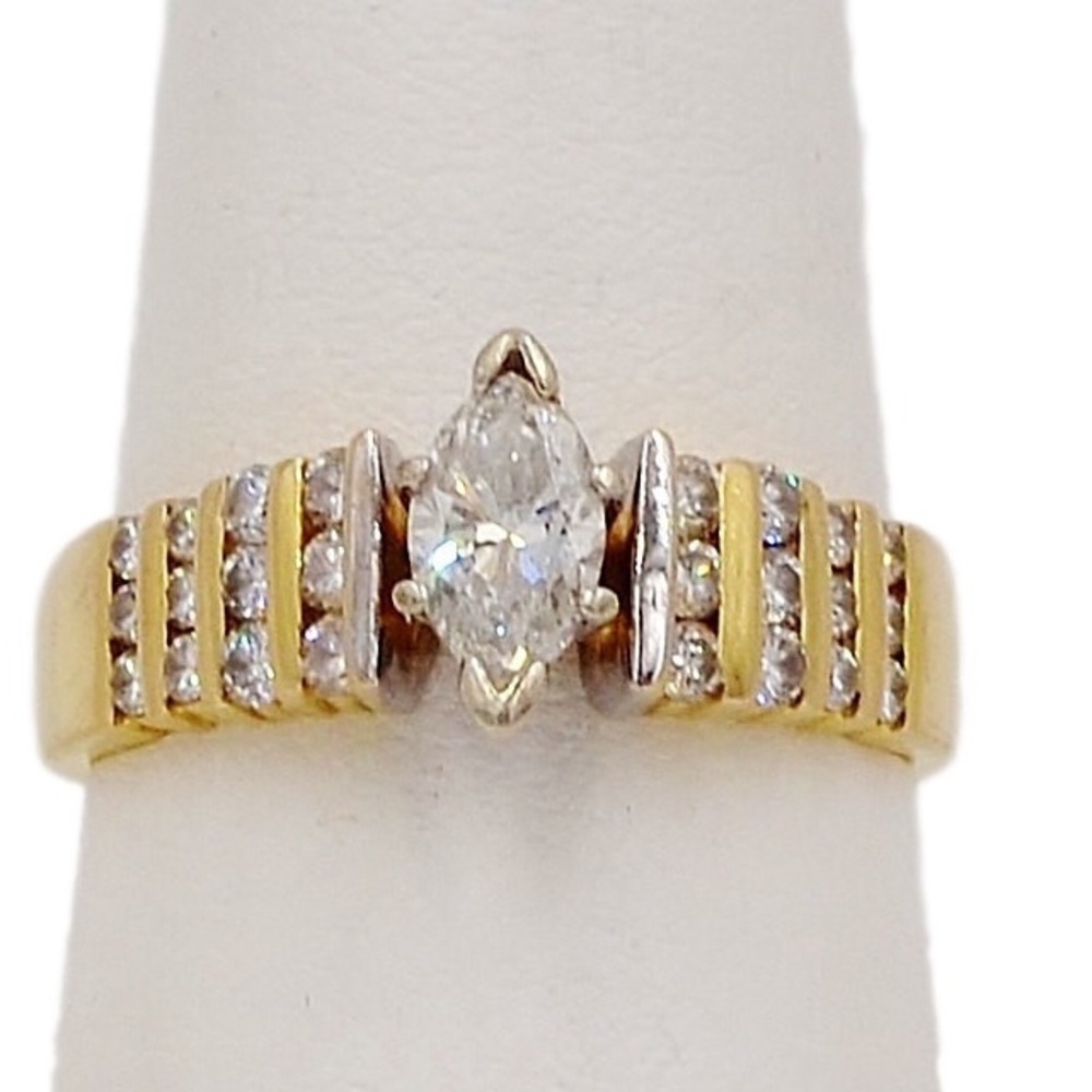 14K Marquise Diamond Ring w/ diamonds .