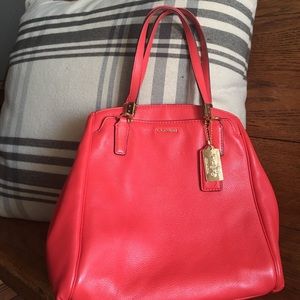 Coral/orange Coach bag
