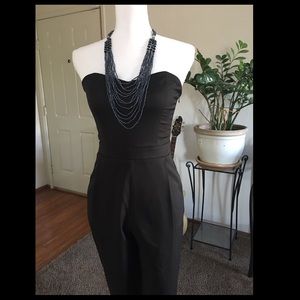 Black strapless jumpsuit.