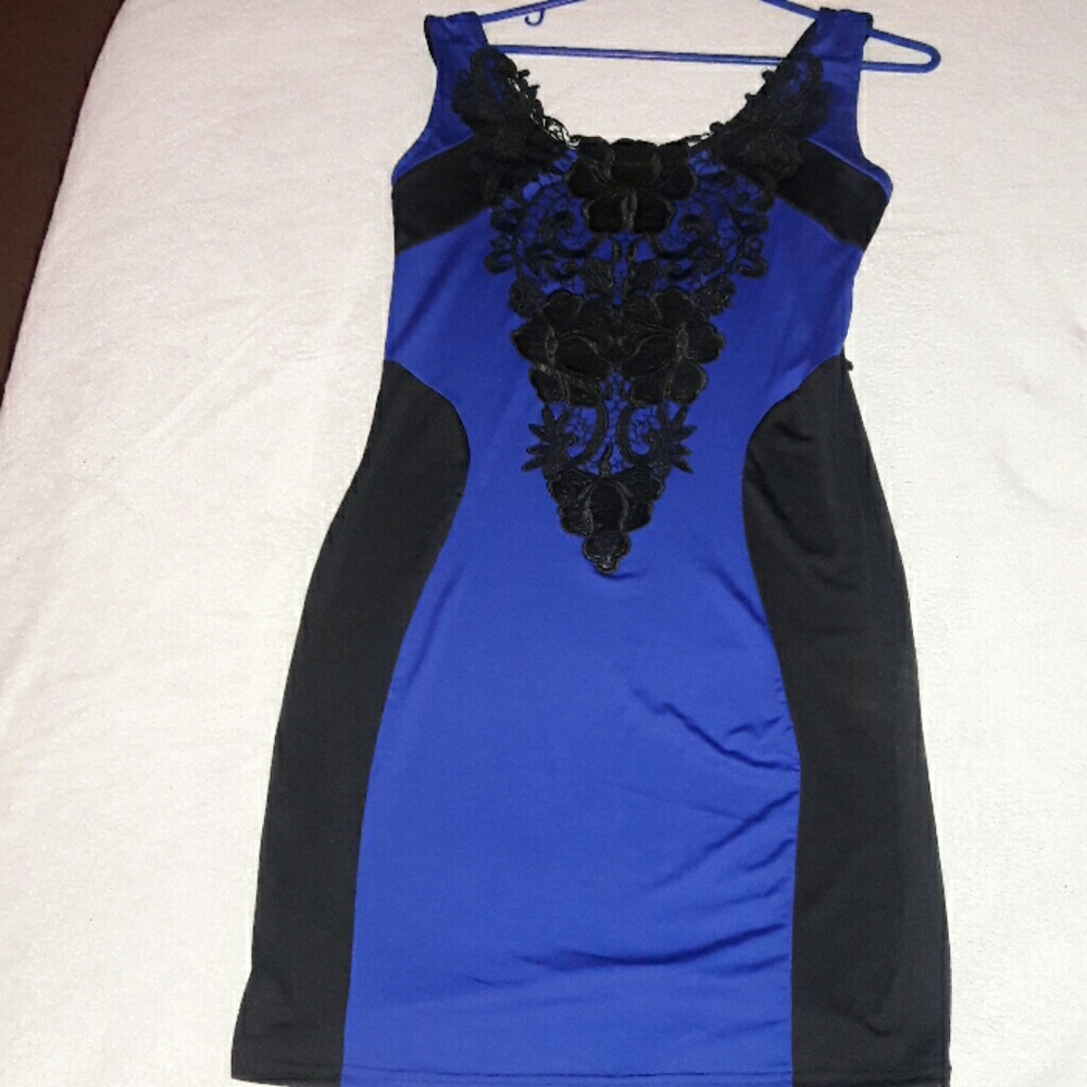 Very cute blue and black dress never worn.