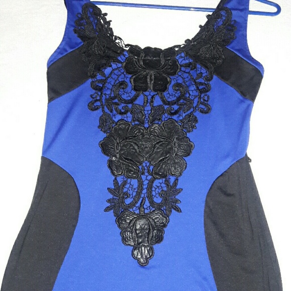 Very cute blue and black dress never worn. - Picture 2 of 4