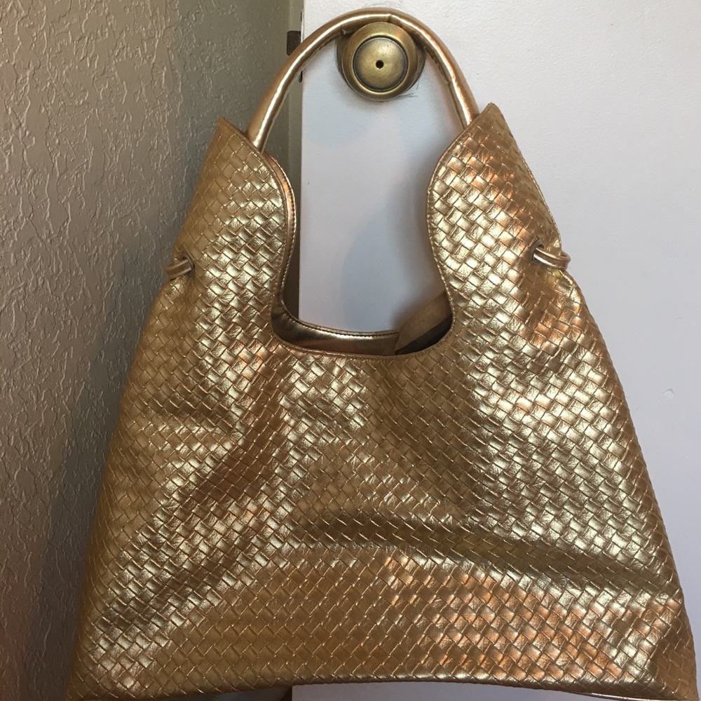 Golden hand bag