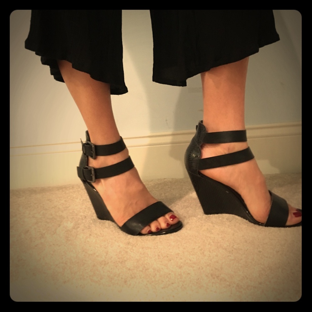 Black heeled double strap with black buckles