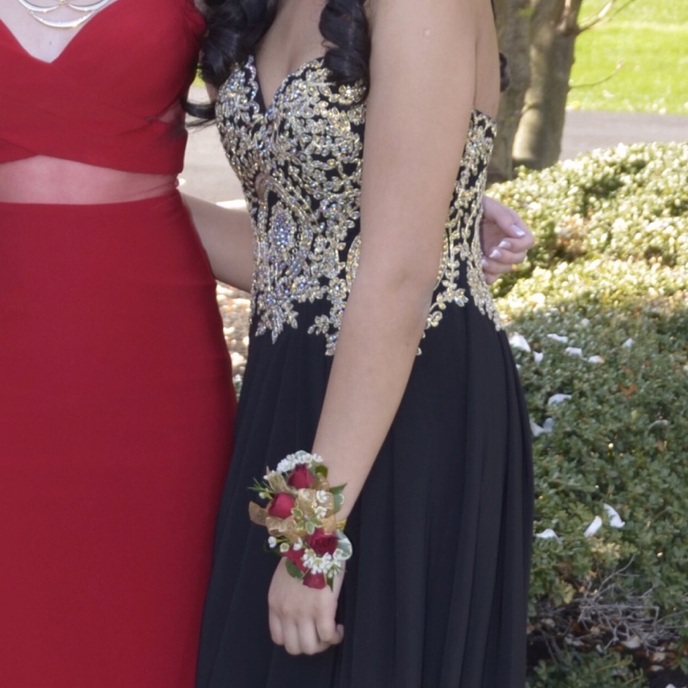 Strapless black gown with gold embroidery