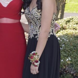 Strapless black gown with gold embroidery